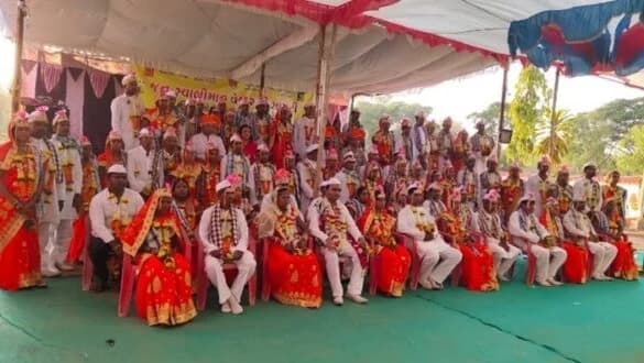 Samuhik vivah — tribal couples at a collective wedding ceremony